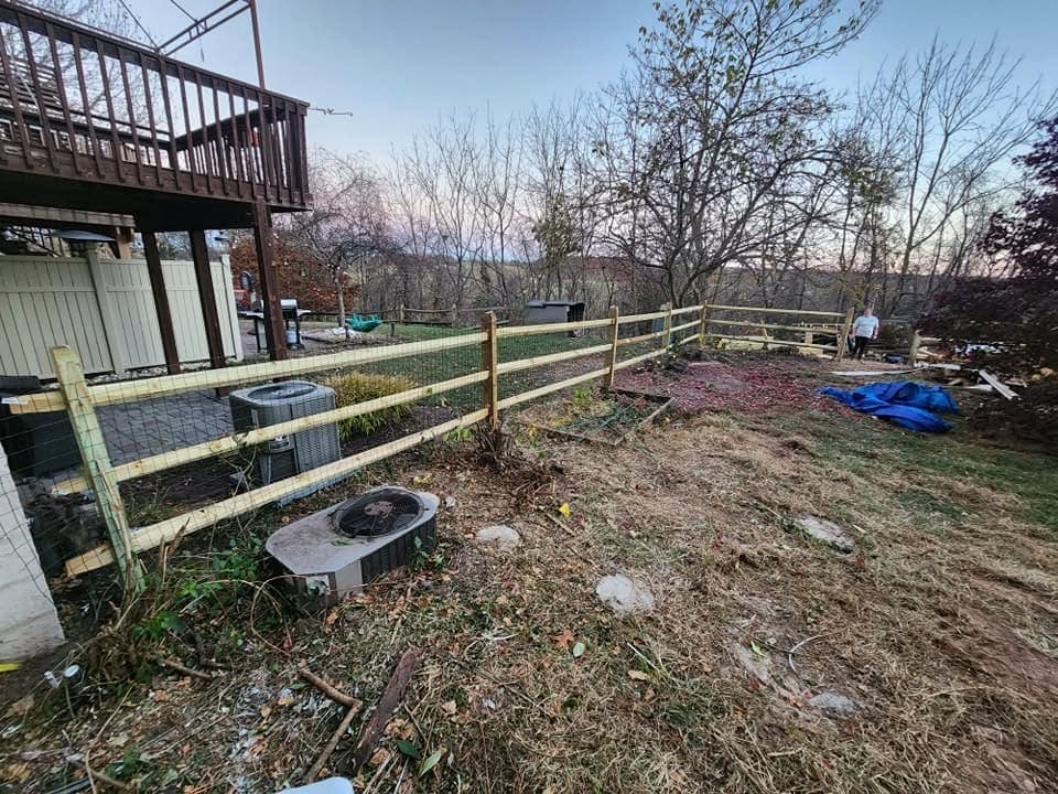 New split-rail fence along a property line