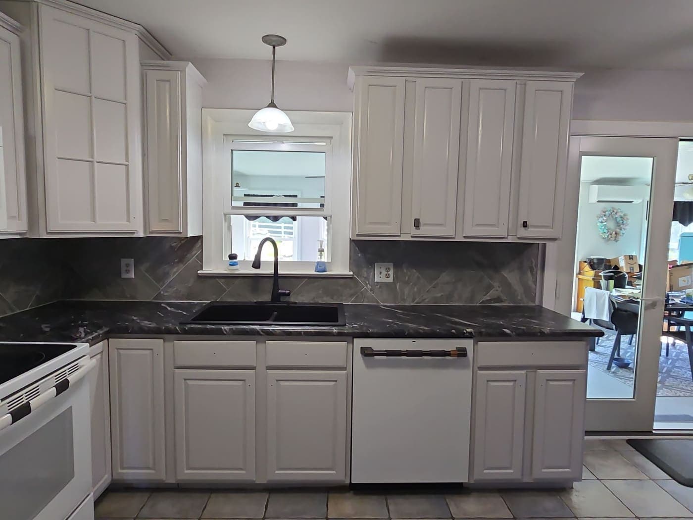 Remodeled kitchen with new cabinets and countertops